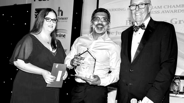 CEO Imran Haidar receiving the Barking & Dagenham Chamber of Commerce Business Growth Award in 2022