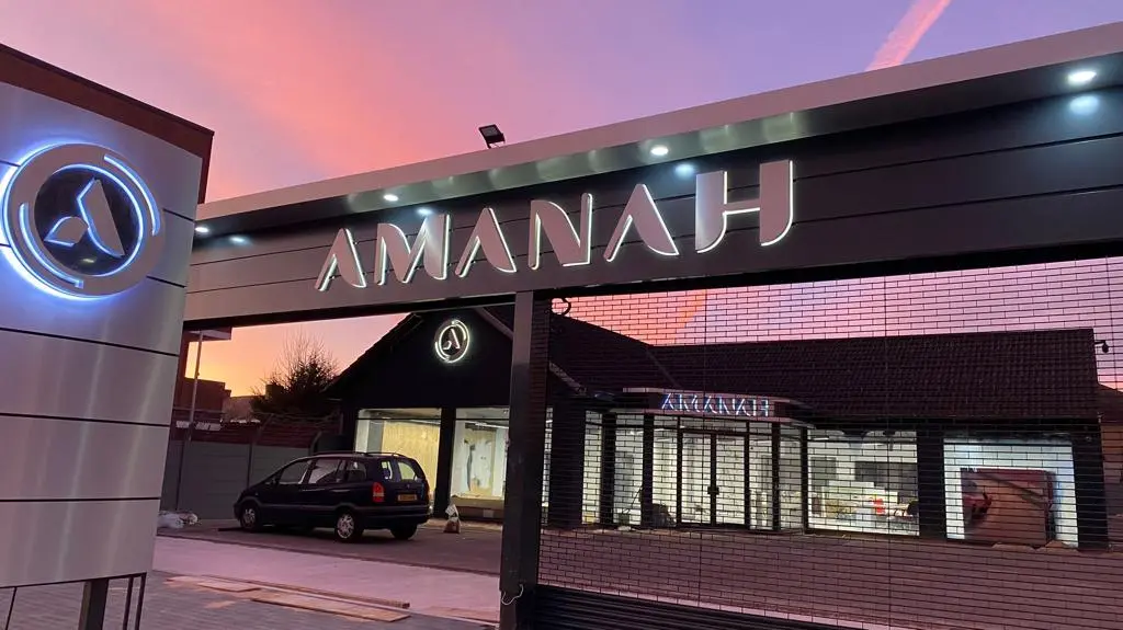 Modern illuminated signage for Amanah, enhancing visibility and branding.