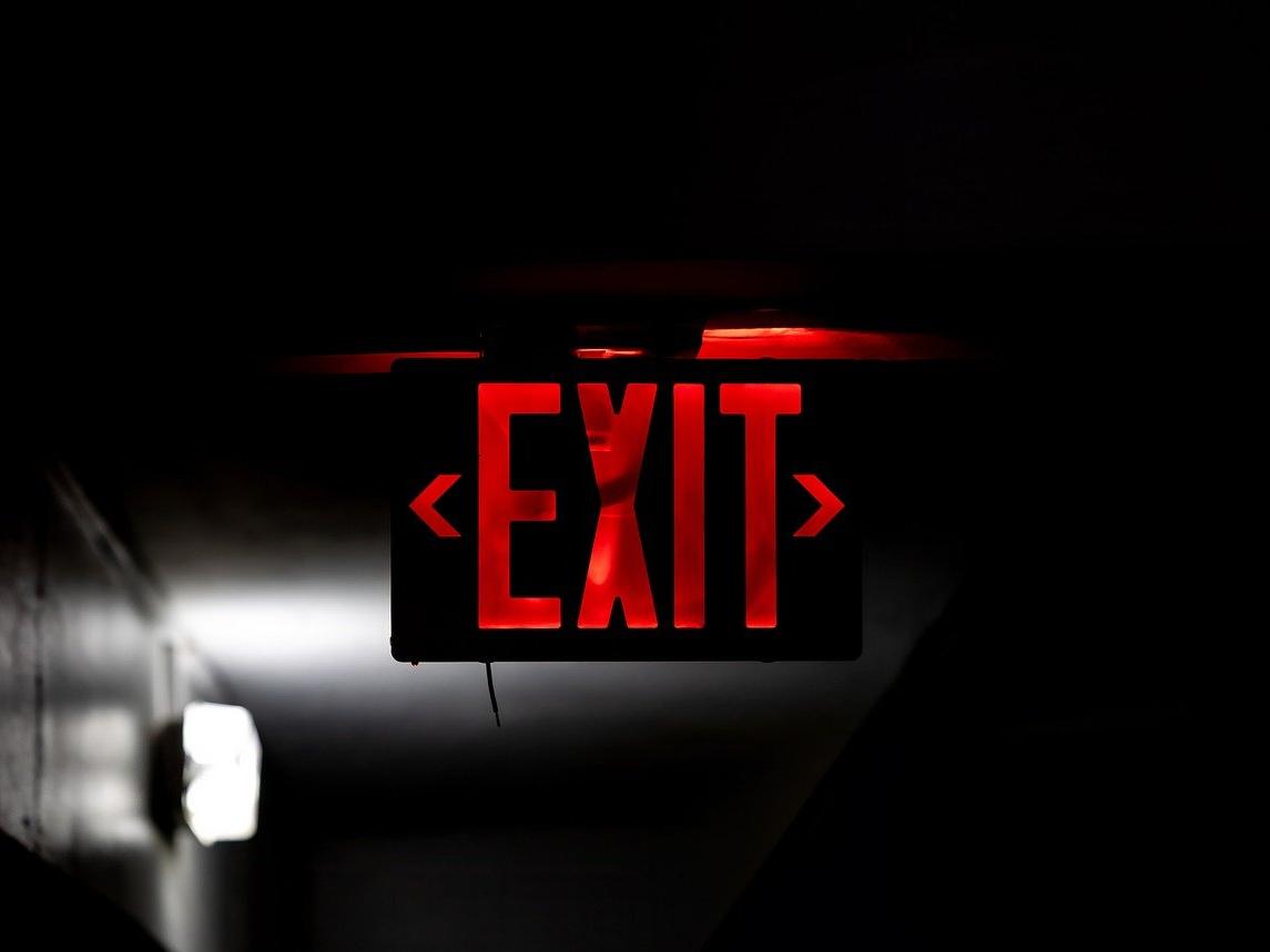 Wayfinding signage with illuminated exit signs for smooth navigation in buildings