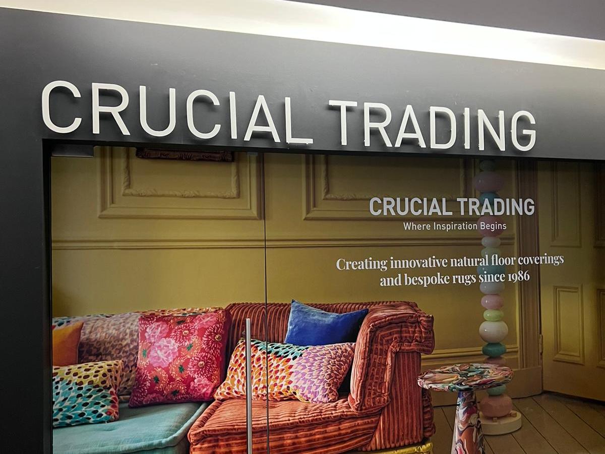  Interior branding and wayfinding signage for Crucial Trading showroom