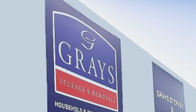 Blue flat panel signage for Grays Storage & Removals.